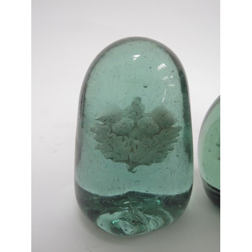 6586 - Two Victorian green glass dumps with plaster inclusions of Scottish Thistle, tallest 11cm