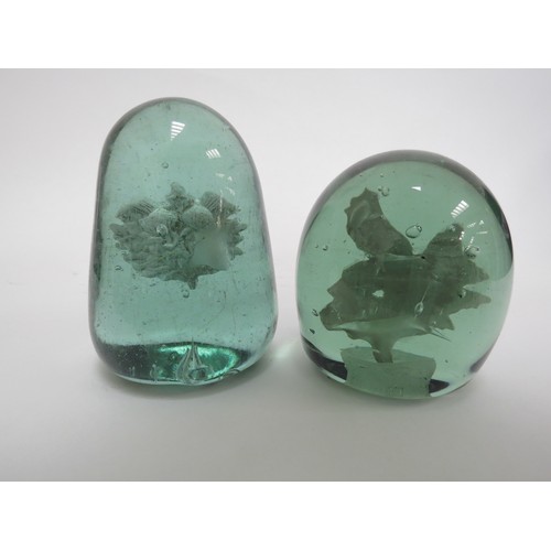 6586 - Two Victorian green glass dumps with plaster inclusions of Scottish Thistle, tallest 11cm