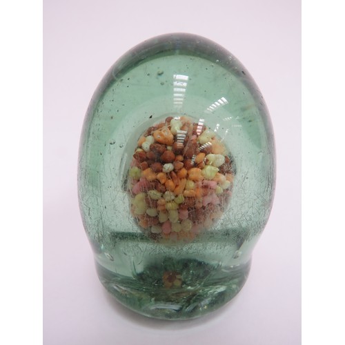 6600 - A Victorian green glass dump bead filled 