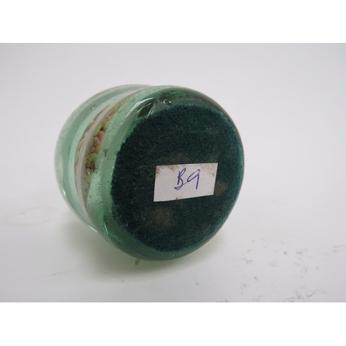 6600 - A Victorian green glass dump bead filled 