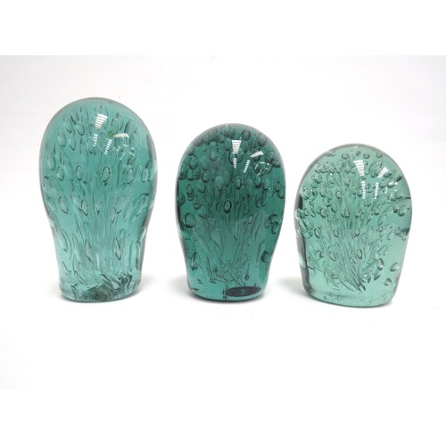 6580 - Three Victorian green glass dumps all with bubble inclusions, tallest 16cm