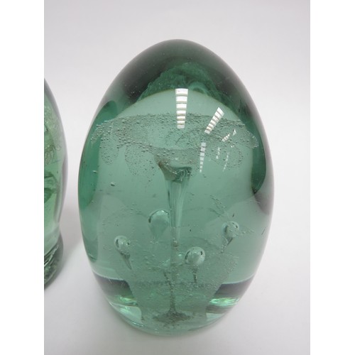 6584 - Three Victorian green glass dumps all with floral inclusions, tallest 13cm