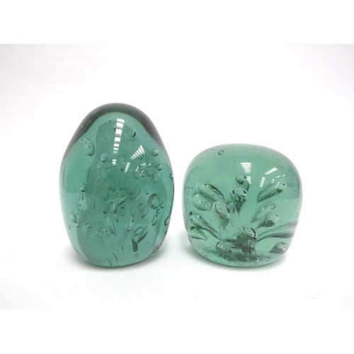 6576 - Two Victorian green glass dumps both with bubble inclusions, tallest 12cm