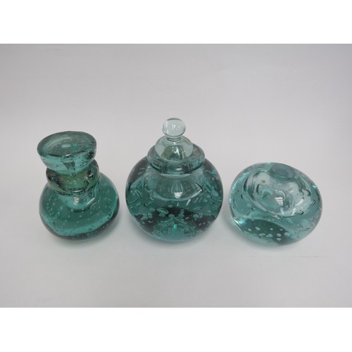 6568 - Three Victorian green dump glass inkwells all with bubble inclusions, (one with stuck stopper and da... 