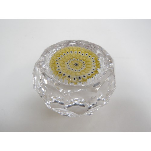 6714 - A Whitefriars facetted glass paperweight with yellow and white millefiori canes