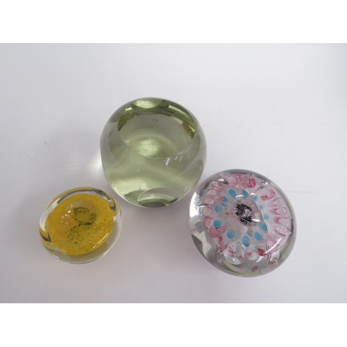 6715 - Three paperweights including yellow with green butterfly, pale yellow glass and another (3)