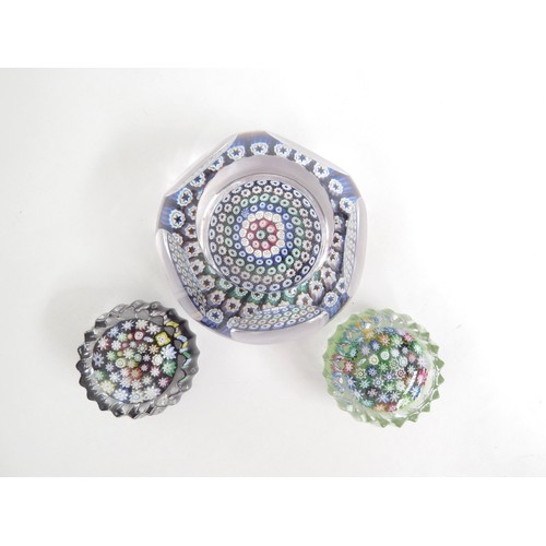 6708 - A Whitefriars millefiori cane paperweight and two smaller examples (3)