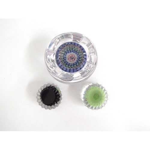 6708 - A Whitefriars millefiori cane paperweight and two smaller examples (3)