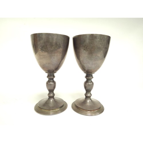 6686 - A pair of Garrard and Co Ltd silver goblets, hallmarked for 1977, London. Monogram to bowls. 15cm hi... 