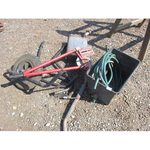 3588 - A wheelbarrow frame, an exhaust section, a pipe bender and a tank containing hose