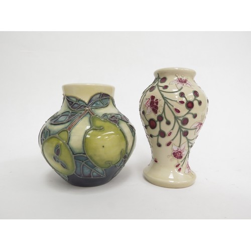 6633 - Two pieces of Moorcroft including Pears design small vase, 8.5cm tall and a Tembusu pattern vase, 9.... 