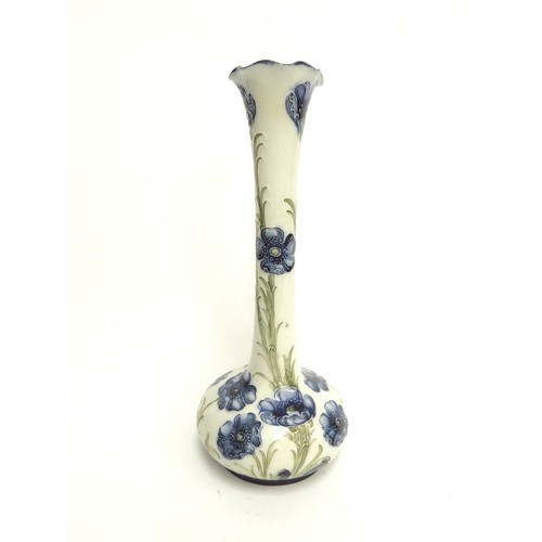 6669 - A Macintyre Moorcroft Florian Ware Poppy pattern vase, circa 1903-04, with blue flowers against a cr... 