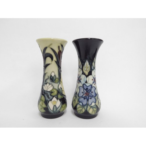 6665 - Two Moorcroft vases, Bulrushes Waterlily pattern and Tudor Rose pattern, both 13cm tall