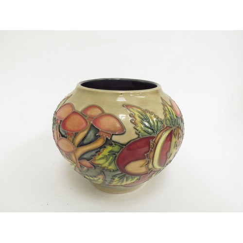 6673 - A Moorcroft Pastimes pattern vase, 2000 Limited edition, 136/250. 10.5cm