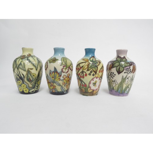 6674 - Set of four Moorcroft small baluster vases, ' The Seasons ', dated 2000, each 9.5cm high