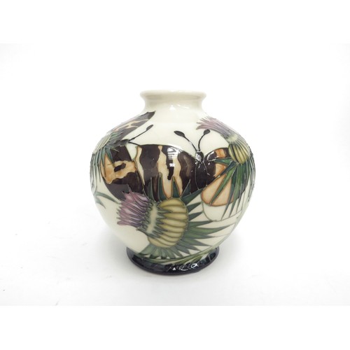 6675 - A Moorcroft Northumberland pattern vase, designed by Emma Bossons, 11cm tall