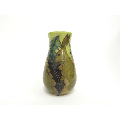 6678 - A Dennis China Works TRIAL pattern vase in lime green depicting hares, 14cm tall