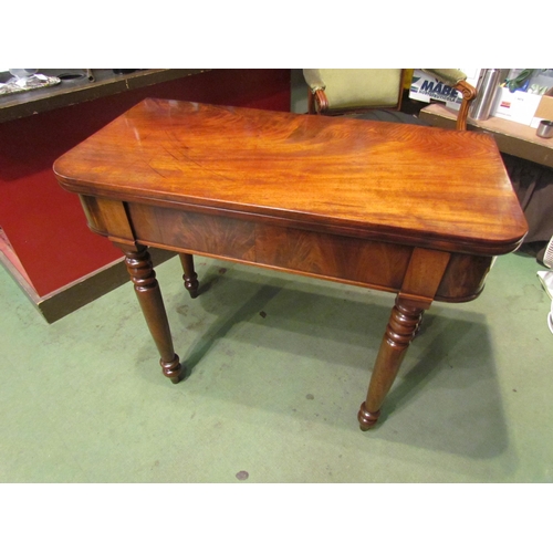 4001 - A Circa 1850 flame mahogany tea/side table the fold-over swivel top on turned and tapering legs, mis... 