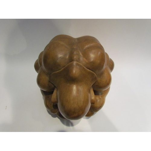 4008 - An Orang Malu Yogiman 'crying man' carved wood figure, 22cm tall