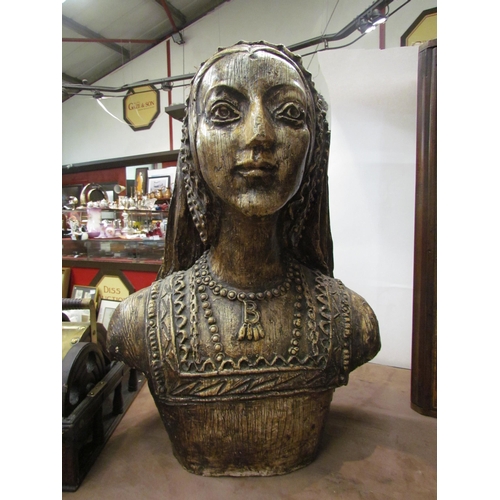 4011 - A wood effect sculptural bust of a Tudor female, 60cm tall x 43cm wide