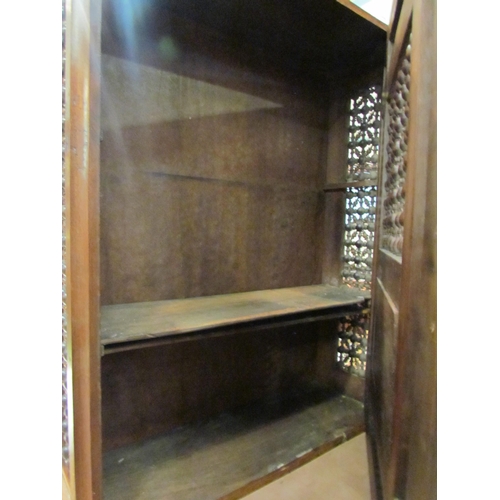 4012 - An Eastern Mashrabiya shelved cupboard, 64cm tall x 51cm wide x 17cm deep