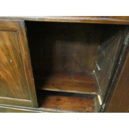 4039 - A 19th Century mahogany tray top two door cupboard, plinth base, 128cm tall x 121cm wide x 48cm deep