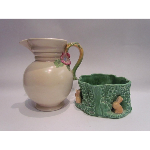 4062 - A Clarice Cliff pottery jug together with a Sylvac pot with rabbit decoration (2)