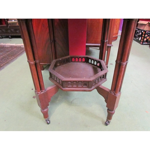 4082 - An Edwardian walnut octagonal top centre table, with under-tier, 74cm tall x 75cm wide