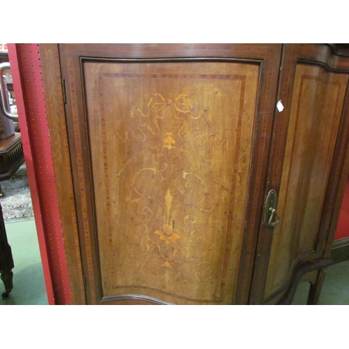 4091 - An Edwardian mahogany display cabinet with bow front, satinwood inlay and marquetry, on spade legs, ... 