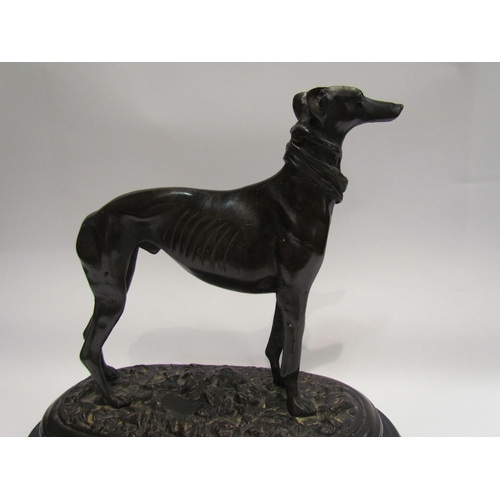 4122 - After Pierre-Jules Mene (1810-1879) a bronze figure of a greyhound signed MENE.  Height 28.5cm