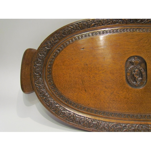 4129 - A military carved oak tray 