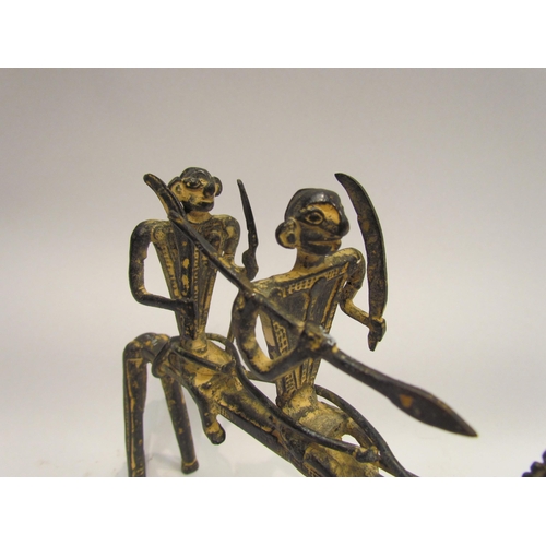 4149 - A metal sculpture of two figures riding a horse, possibly Dogon, 18cm tall