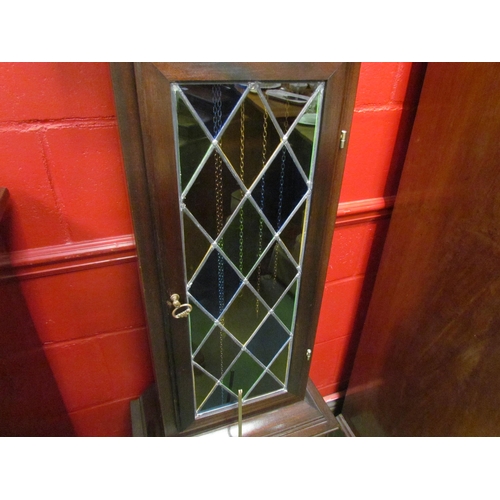 4152 - A modern long case clock with moonphase dial and lead glazed door, with weights and pendulum