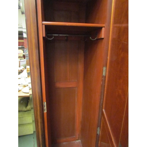 4153 - An Edwardian inlaid mahogany wardrobe with central mirrored door, 218cm tall x 155cm wide x 57cm dee... 