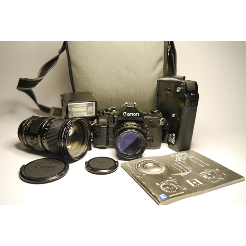 7041 - A Cased Canon AE-1 35mm film SLR body with a Canon FD 35-105mm f3.5 Zoom Manual Focus Lens and Canon... 