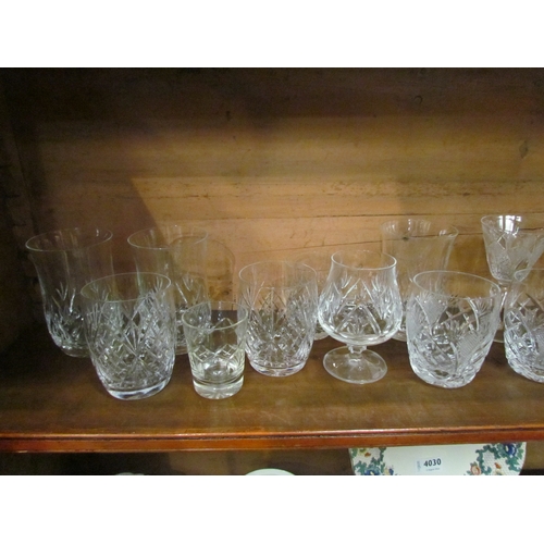 4029 - A selection of drinking glasses to include a set of six cut glass water glasses and three wine glass... 