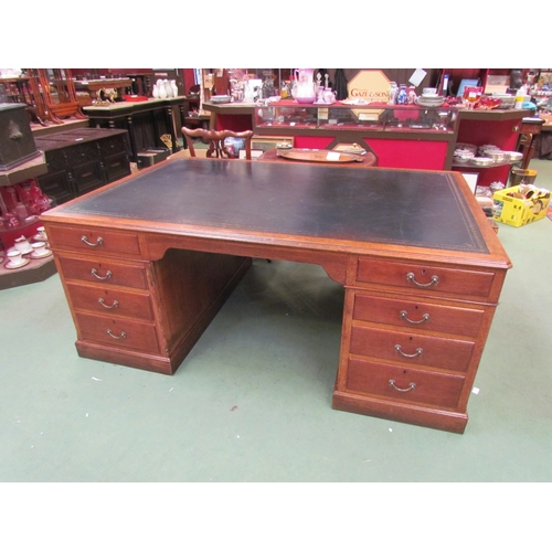 4121 - A large medium oak twin pedestal 'Partners' desk of eight drawers and opposing two single door cupbo... 