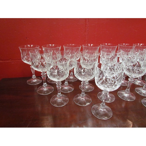 4198 - A suite of 25 heavy crystal wine glasses in two sizes