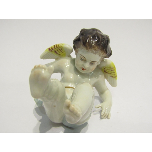 4371 - A Meissen figurine cherub gardener, blue cross swords to base, and a similar figurine of a tumbling ... 