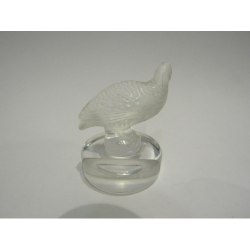 4383 - A Lalique crystal place card holder in the form of a Partridge (signature to base) 6.5cm tall