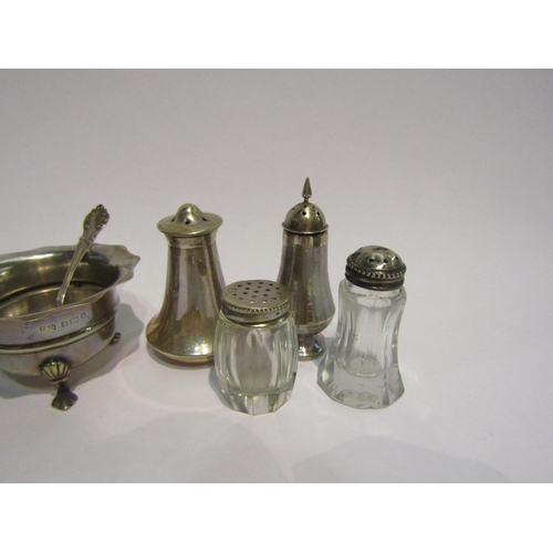 4388 - Two silver salts with matched spoons, one silver, together with four plated pepperettes