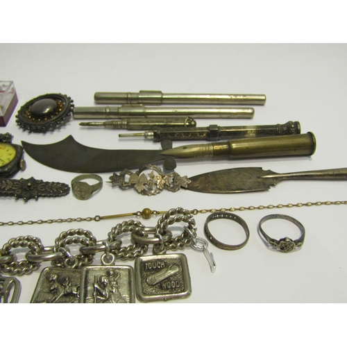 4396 - A bag containing silver rings, bracelets, watch, pens