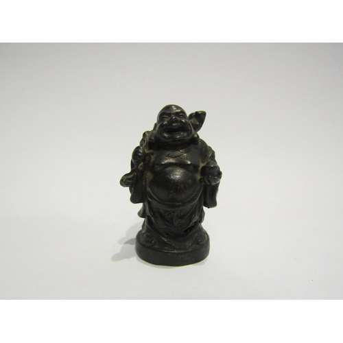 4408 - A bronze figure of a Buddha, 5cm tall