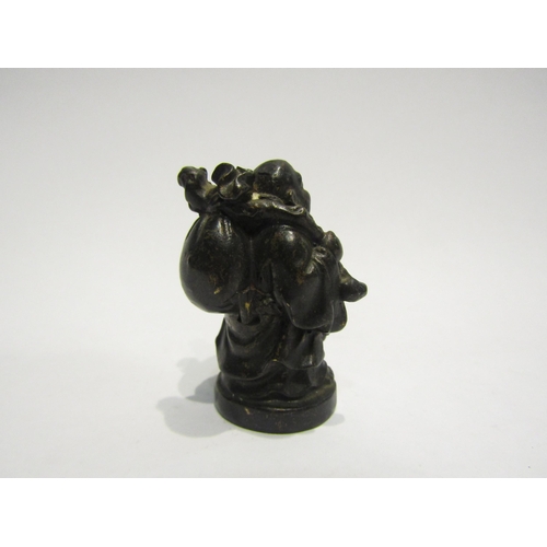 4408 - A bronze figure of a Buddha, 5cm tall