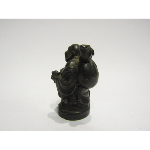 4408 - A bronze figure of a Buddha, 5cm tall