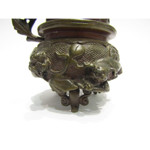 4416 - An Oriental bronze potpourri bowl with finial as a temple dog, apple blossom and temple dog detail, ... 