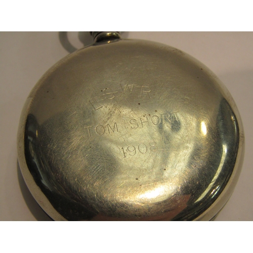 4421 - A nickel plated pocket watch with white enamel dial, set with Roman numerals and subsidiary seconds.... 