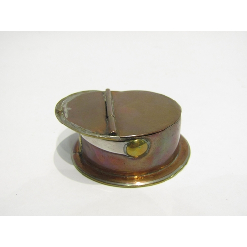 4428 - A brass, copper and white metal snuff box as a military cap