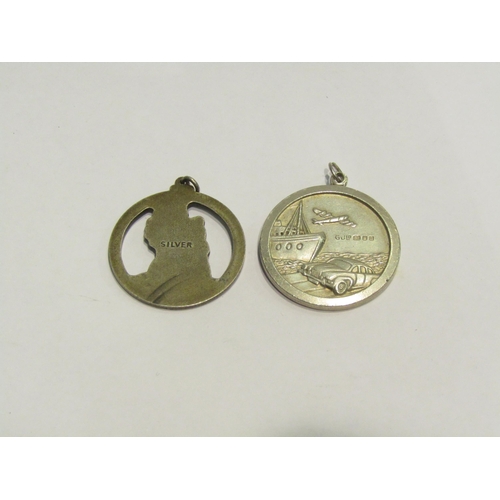 4431 - Two St. Christopher pendants, one silver the other stamped 