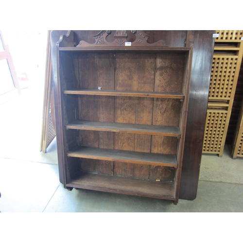 2373 - An Edwardian oak four tier wall hanging shelving unit